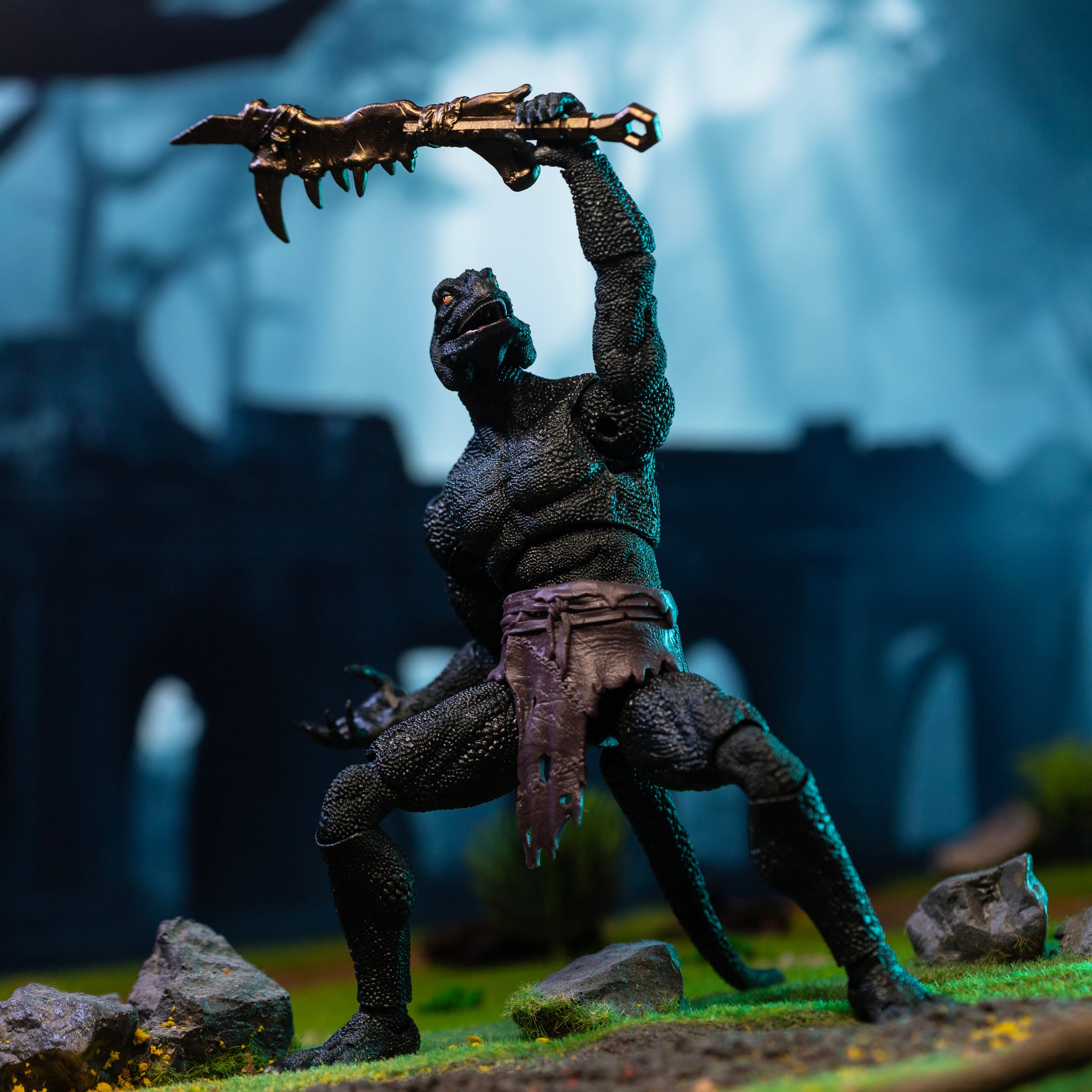 Green Lemurian in loin cloth holding mandible club above head.